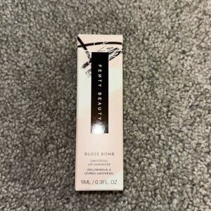 Fenty beauty glass bomb lip luminizer 
Brand new never used, ordered wrong shade